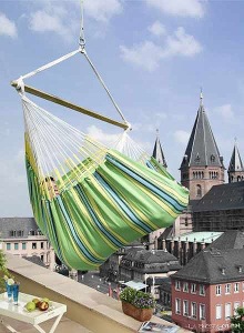 Lounger hammock above houses